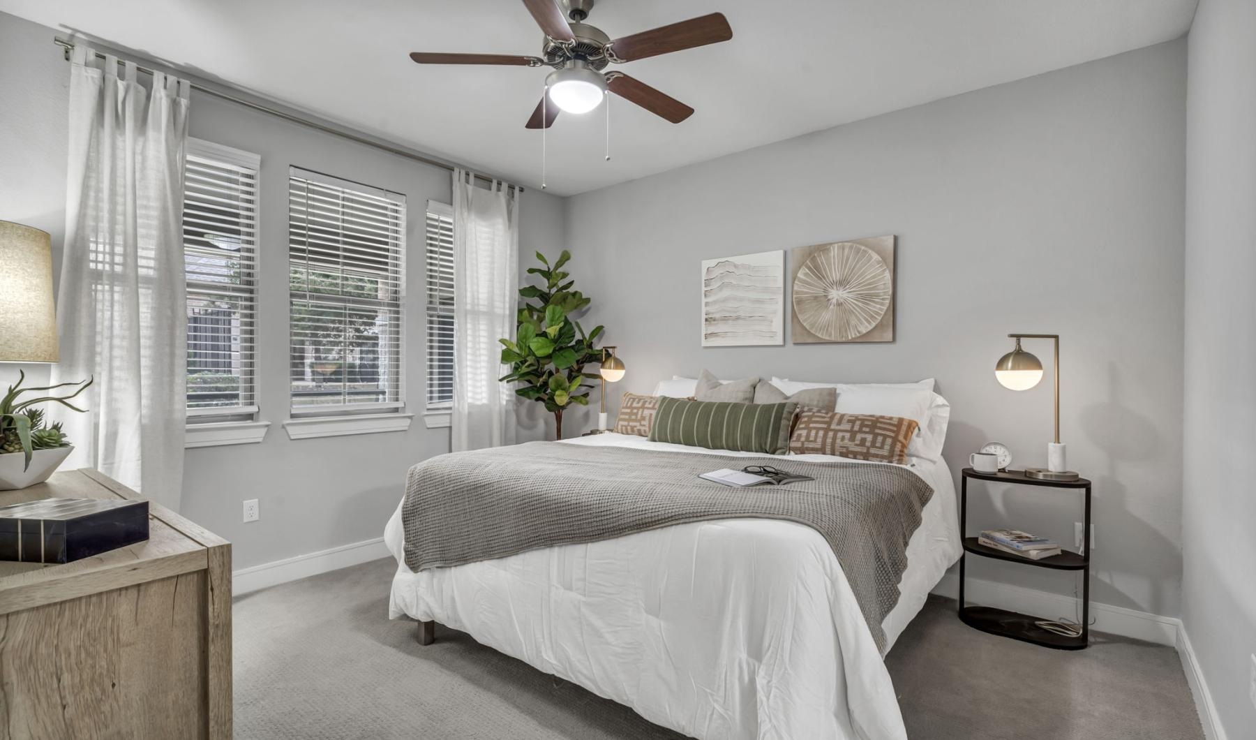 Modern bedroom at Axis Kessler Park Dallas apartments