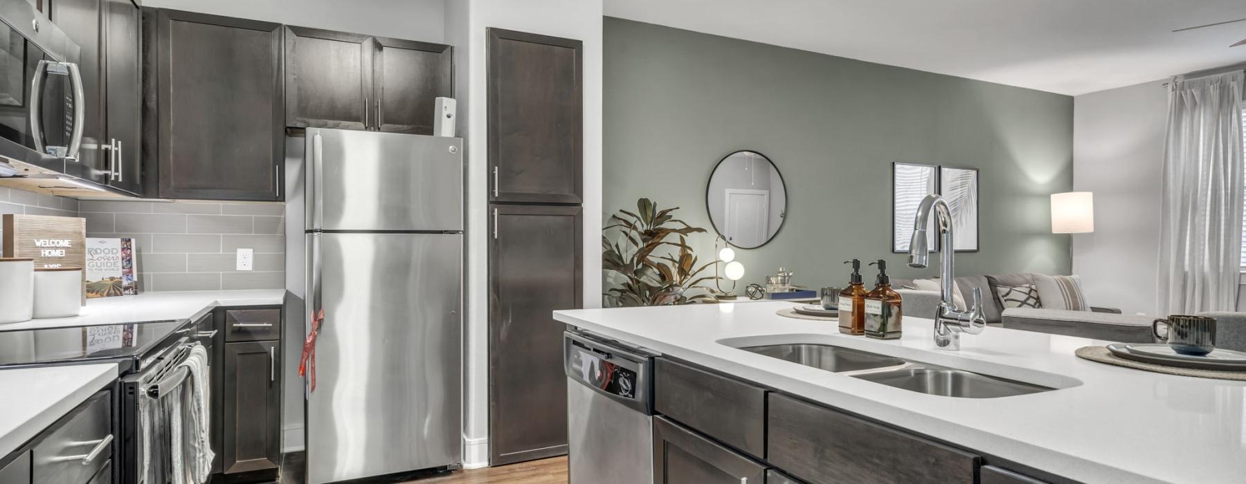 Stylish kitchen with island at Axis Kessler Park Dallas apartments with a view