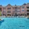 a building with a pool in front